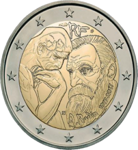 Lors d'une brocante, j'ai découvert une collection d'euros fascinante comprenant la pièce française de 2 euros de 2017, commémorant Auguste Rodin avec un verso neuf et artistique. À côté, une caméra vintage capturait des moments précieux, une radio ancienne diffusait des histoires intemporelles, et un livre ancien sur l'art complétait cette trouvaille culturelle enrichissante.